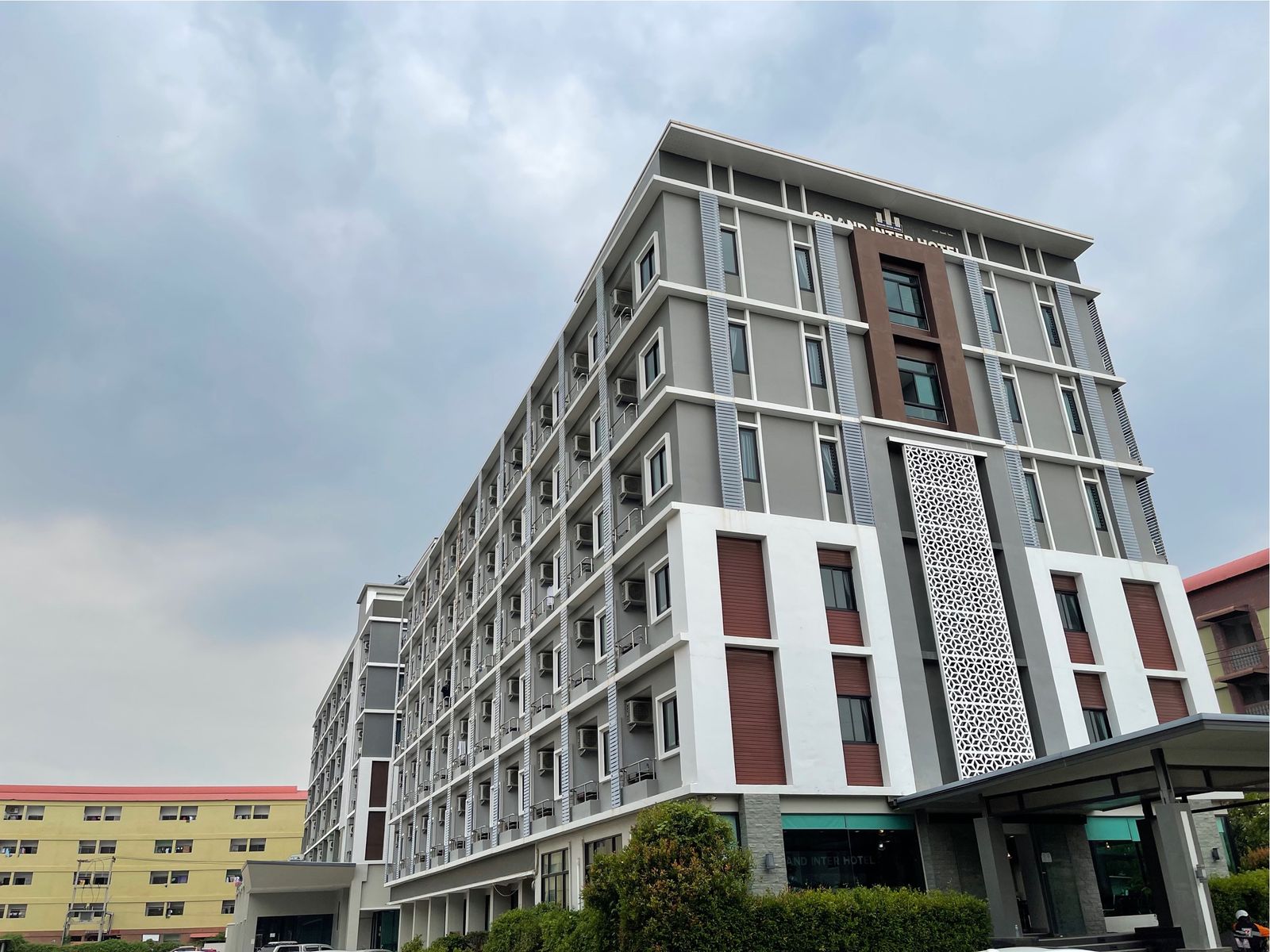 Grand Inter Hotel building with balconies and the entrance canopy