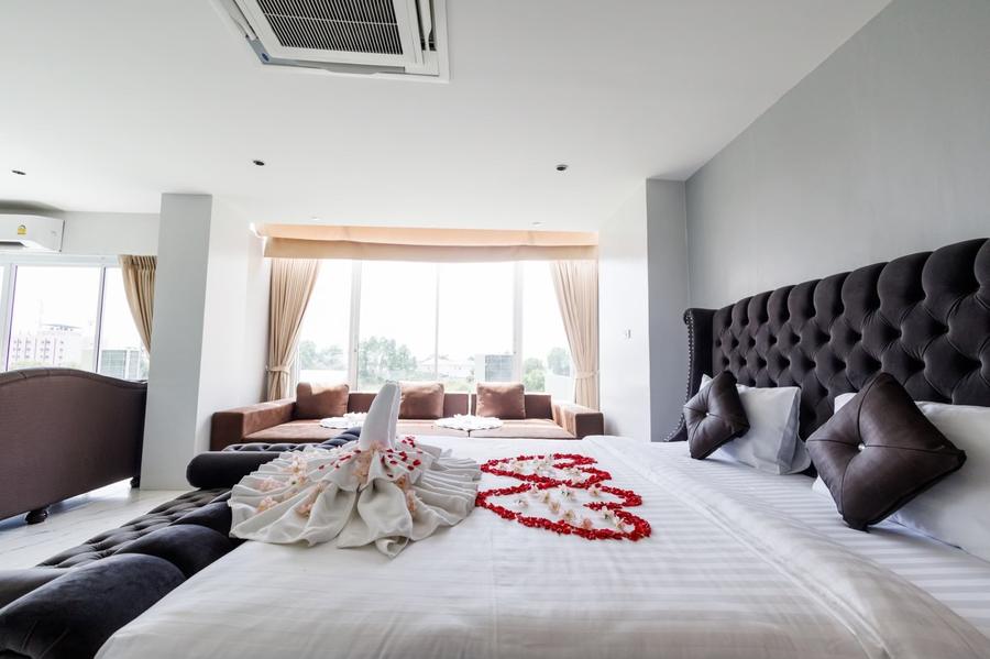 Honeymoon Suite decorated with towel swans and rose-petal hearts