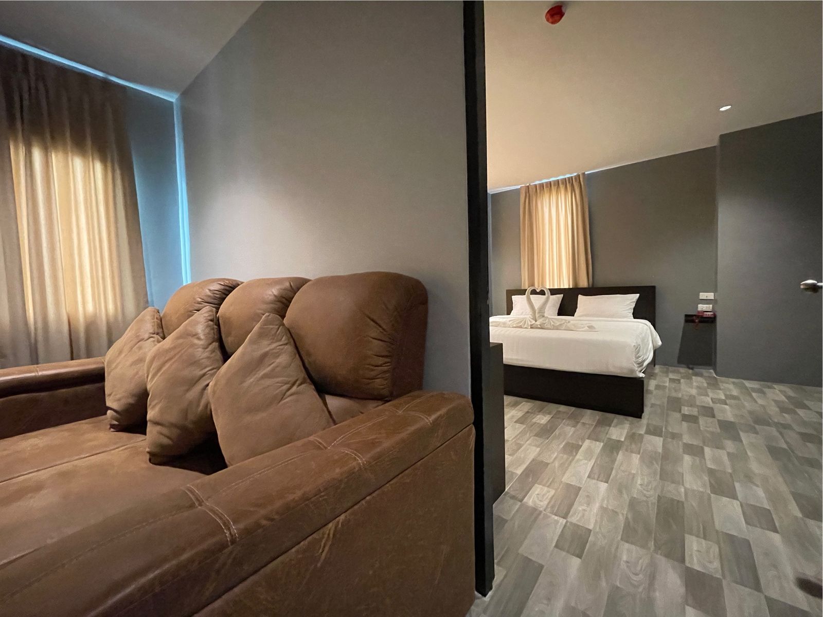 Sofa with a view into the bedroom